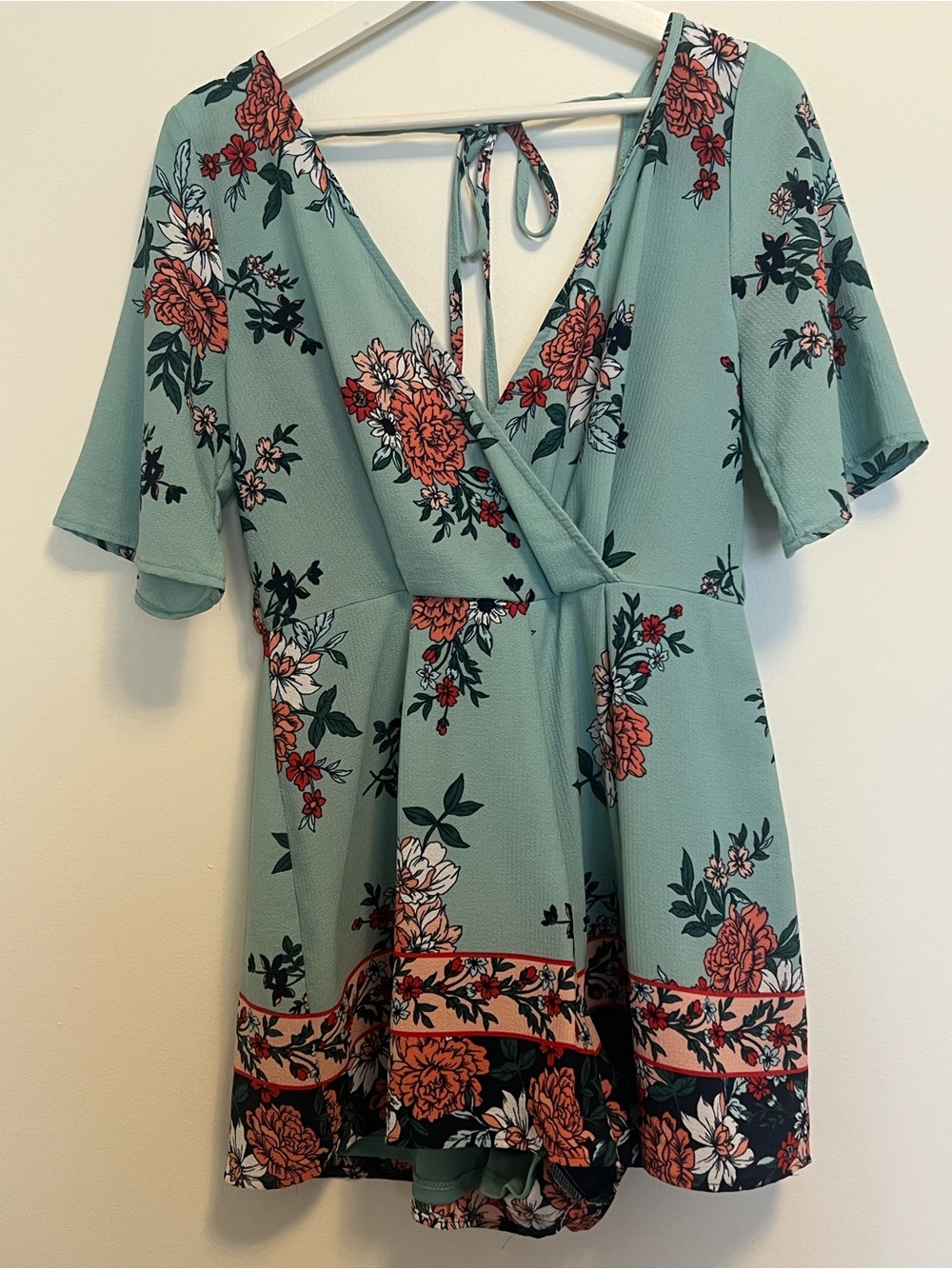 Trixxi Mint Green Floral Romper with Coral & Black Accents